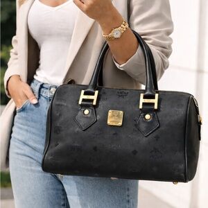 MCM Black Satchel with Gold Accents